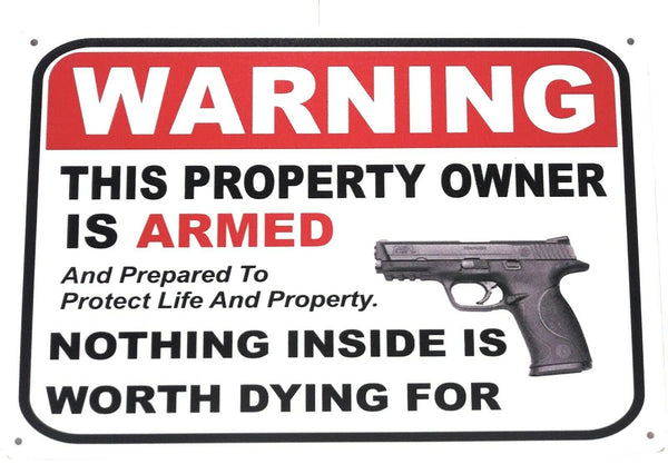 Warning the property owner is armed and prepared to protect life and property.